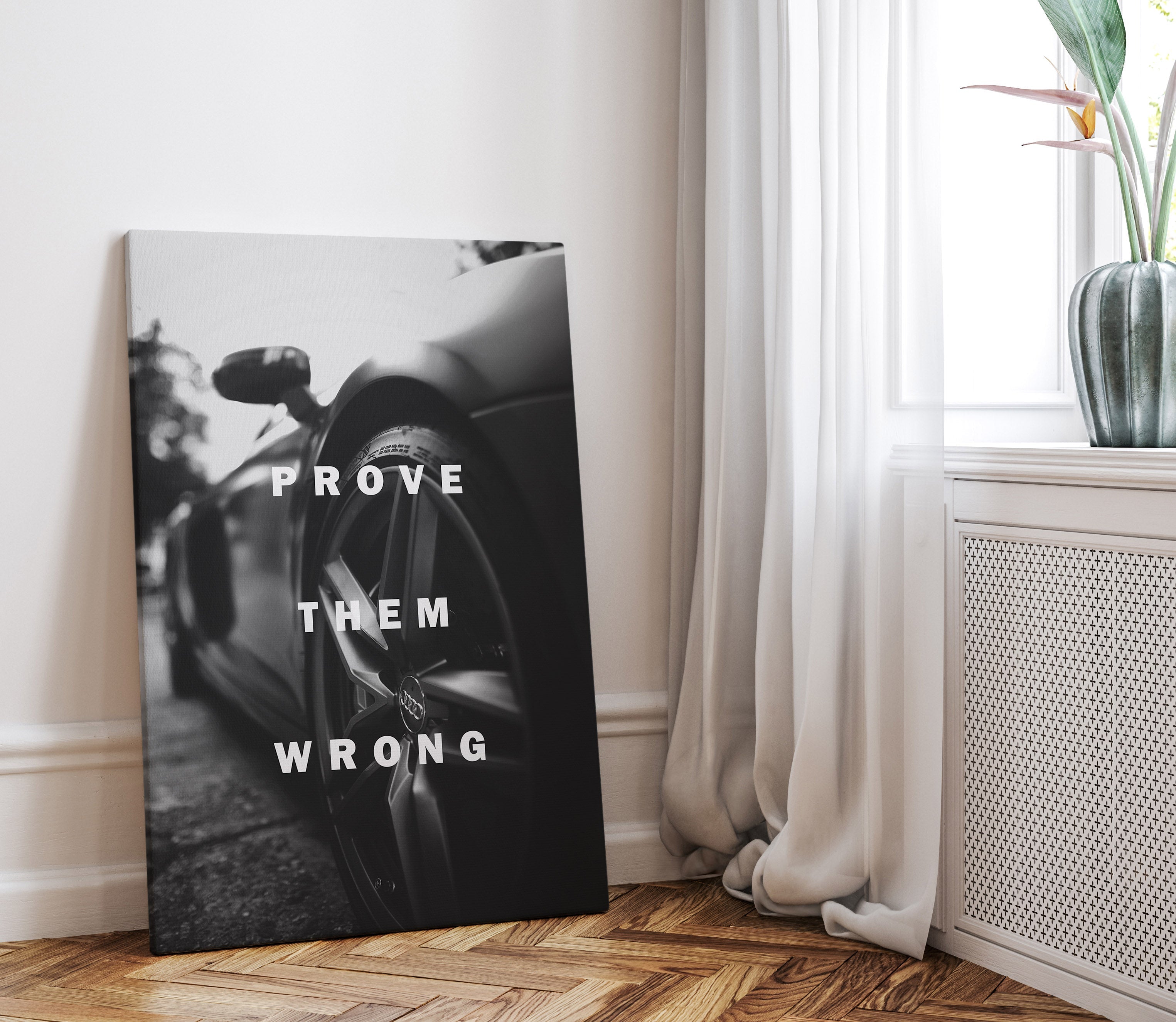 Black and white motivational canvas of a super car with inspirational text