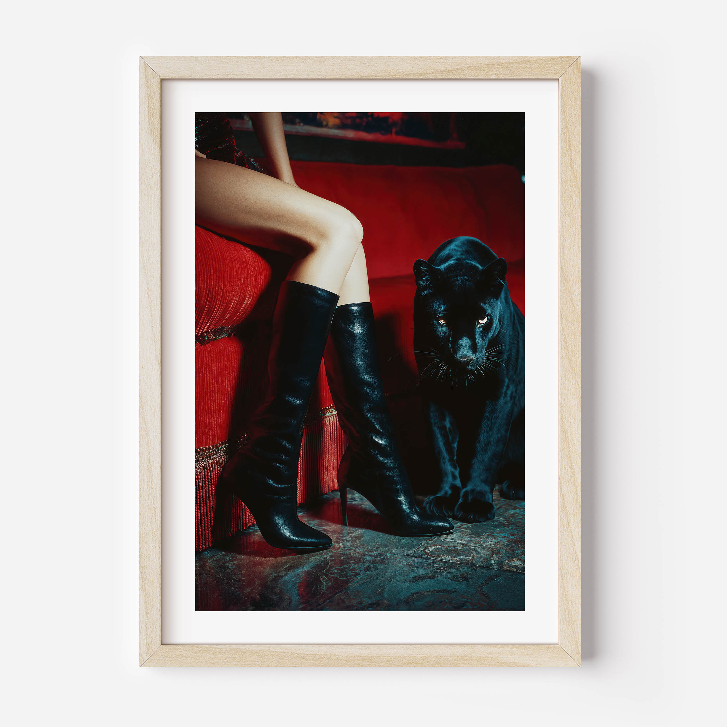 Luxury art print featuring a black panther and woman in boots on a red velvet sofa. Bold, sensual, and stylish wall art for modern interiors.