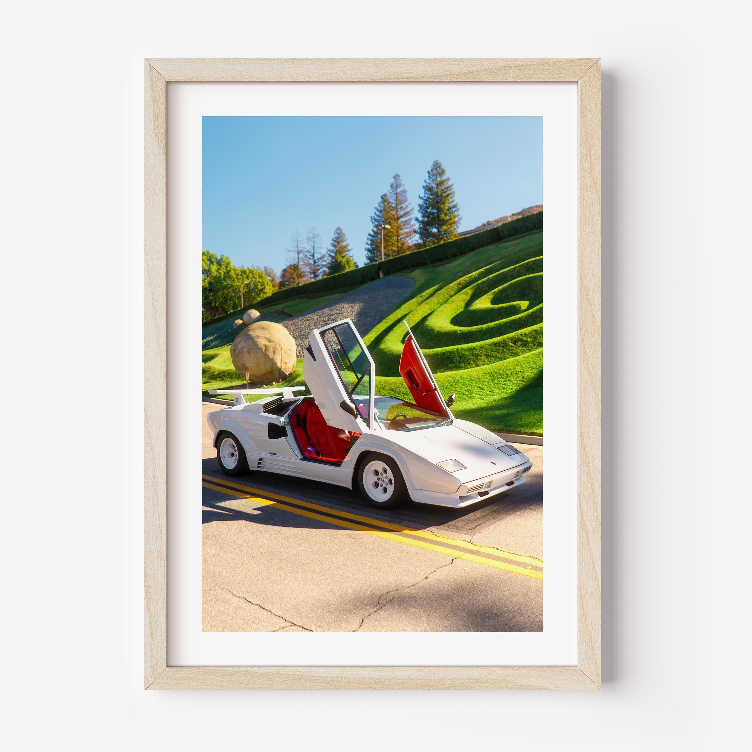 White Lamborghini Countach with scissor doors open – fine art wall print by Deston Isas, retro supercar photography for interiors.