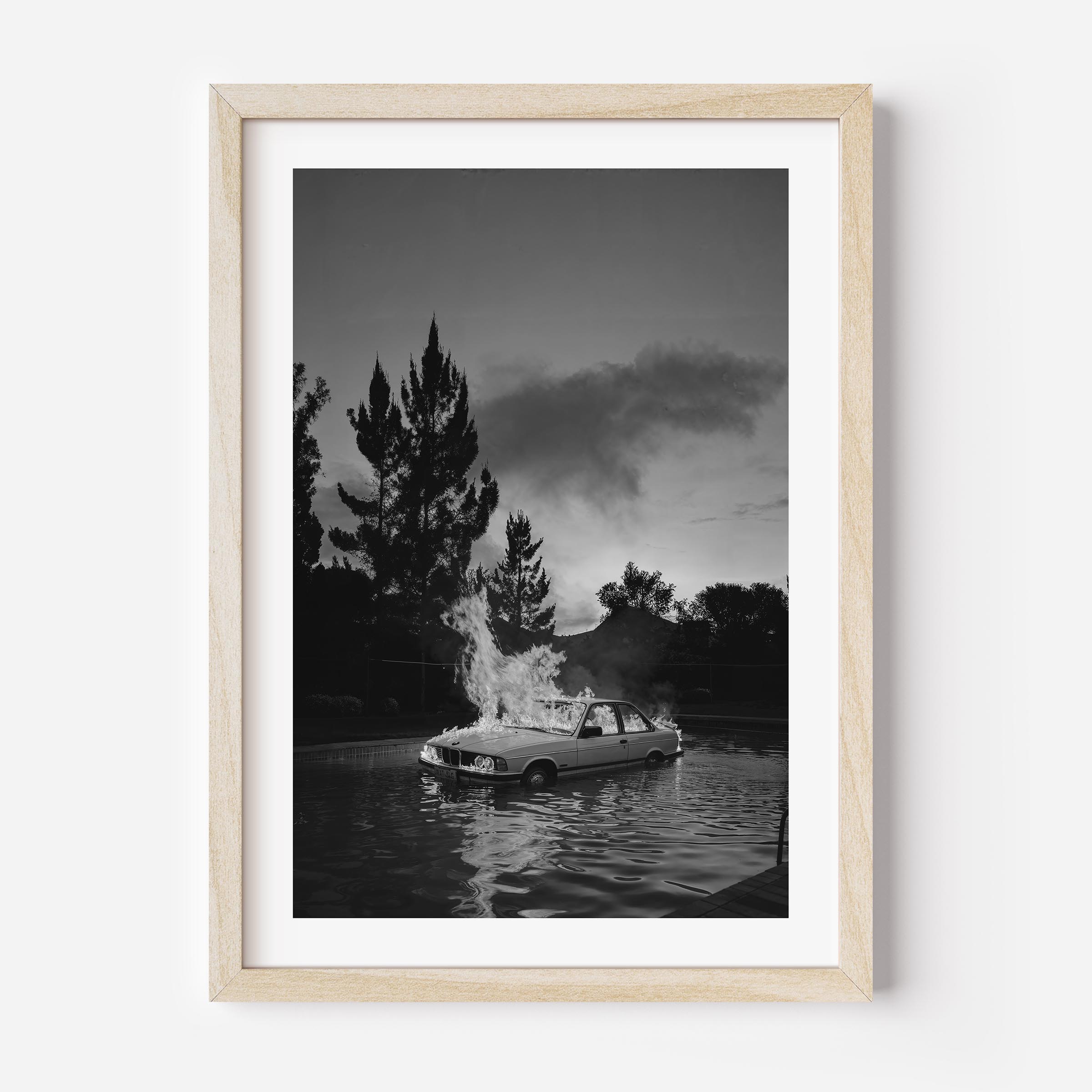 blak and white poster of a bwm car burning in a pool during an afterparty, wall decor, print, interior design