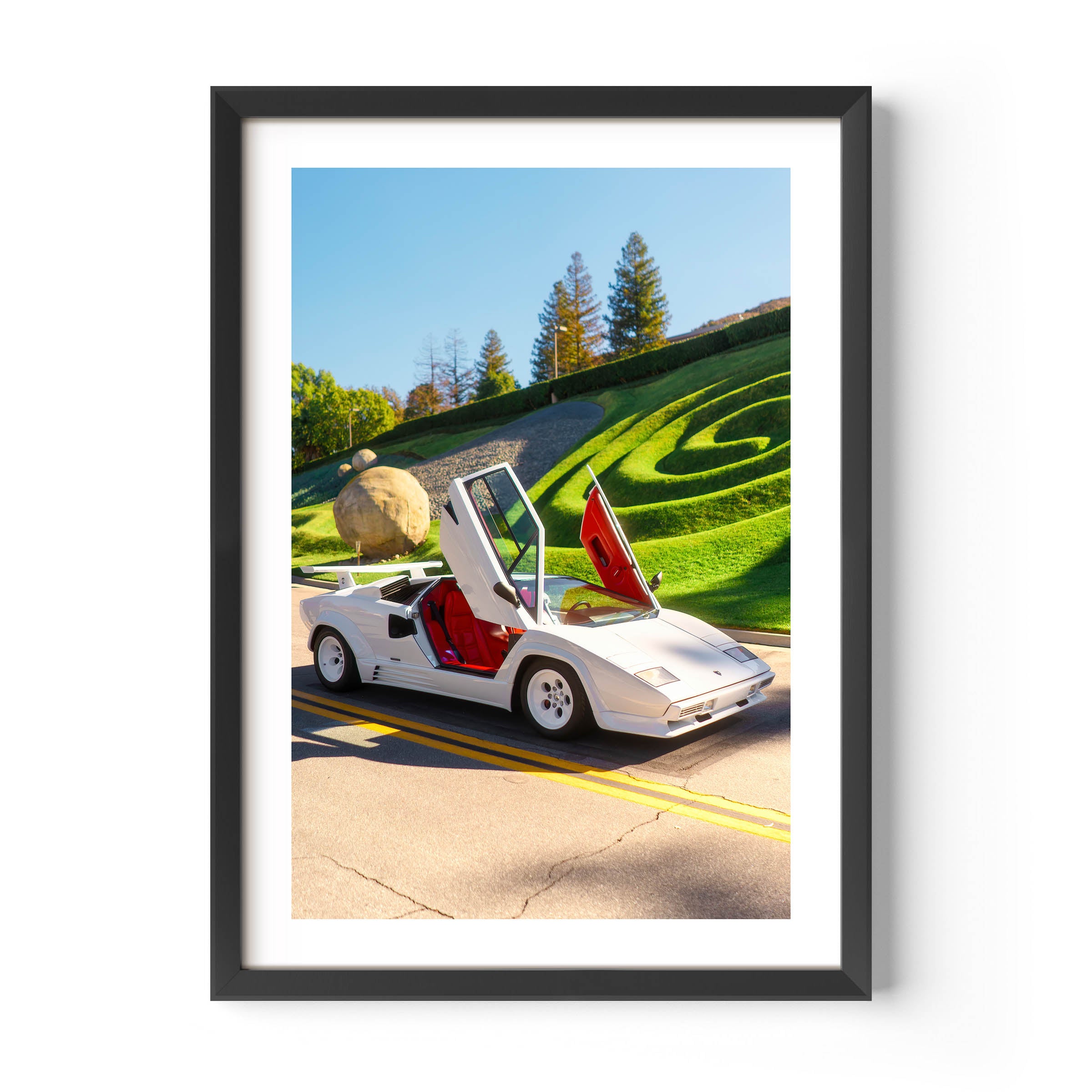 White Lamborghini Countach with scissor doors open – fine art wall print by Deston Isas, retro supercar photography for interiors.