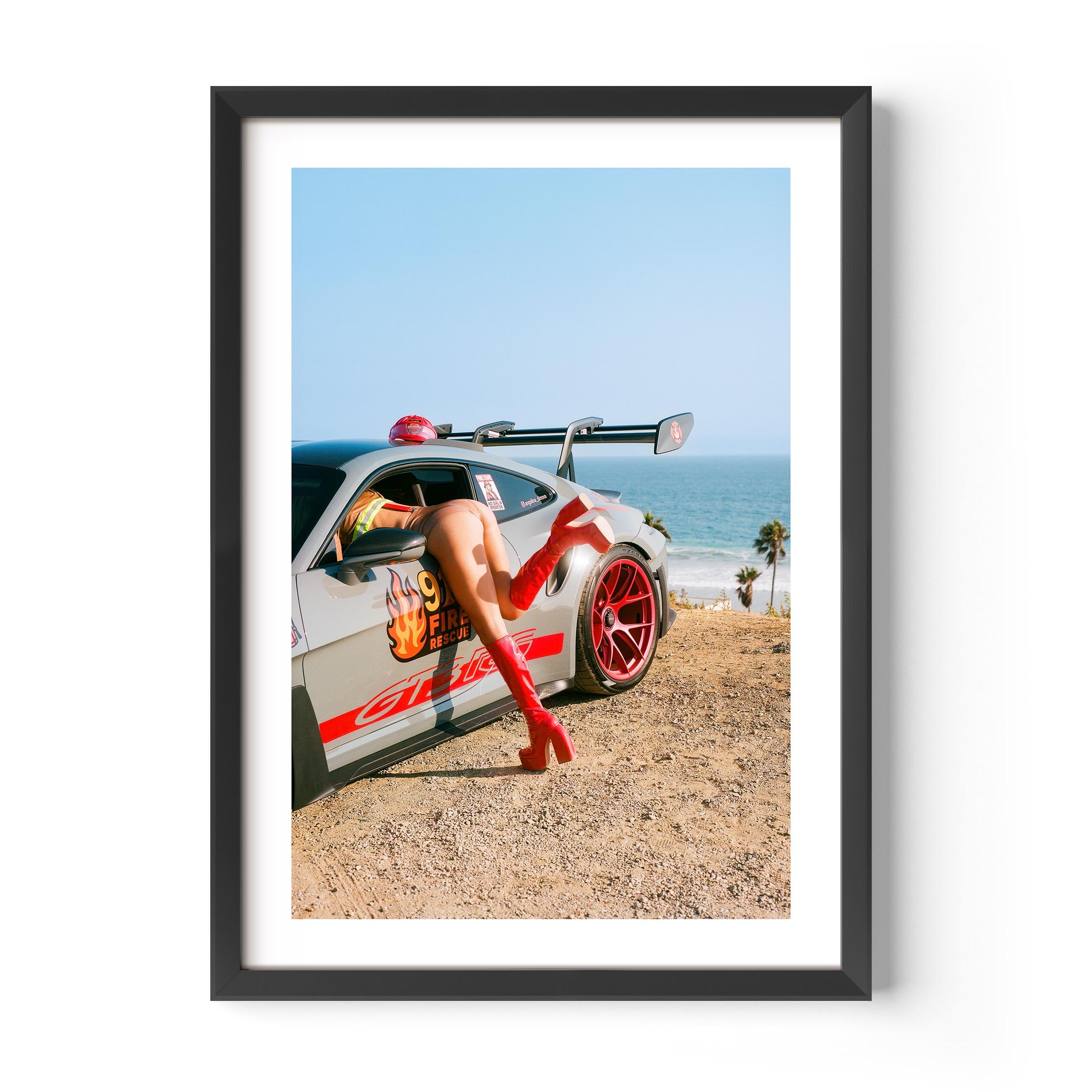 Porsche GT3 RS fire-rescue with red boots by the ocean – bold fine art wall print by Deston Isas for modern interiors.