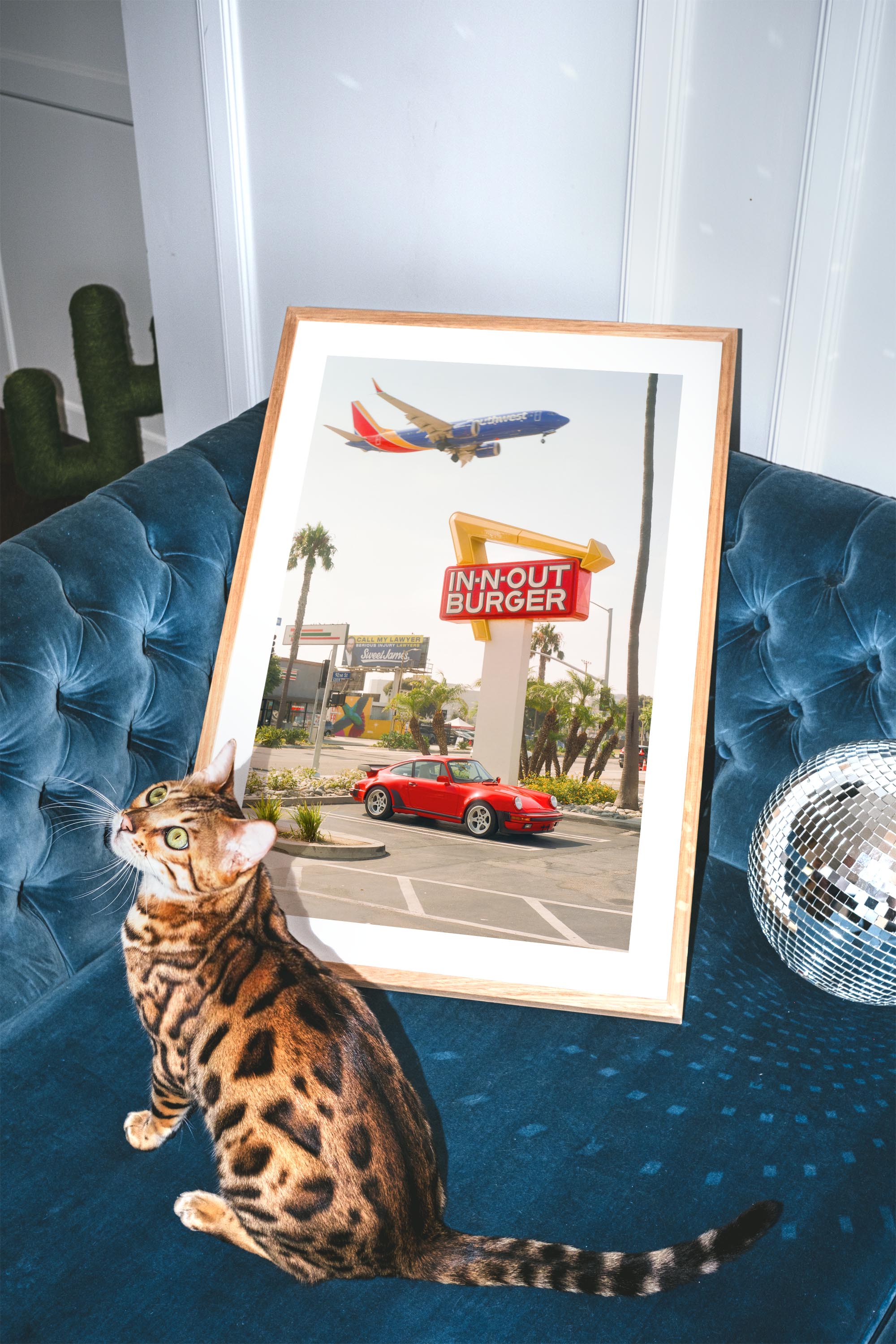 Red Porsche parked at In-N-Out Burger with airplane flying overhead – fine art wall print by Deston Isas