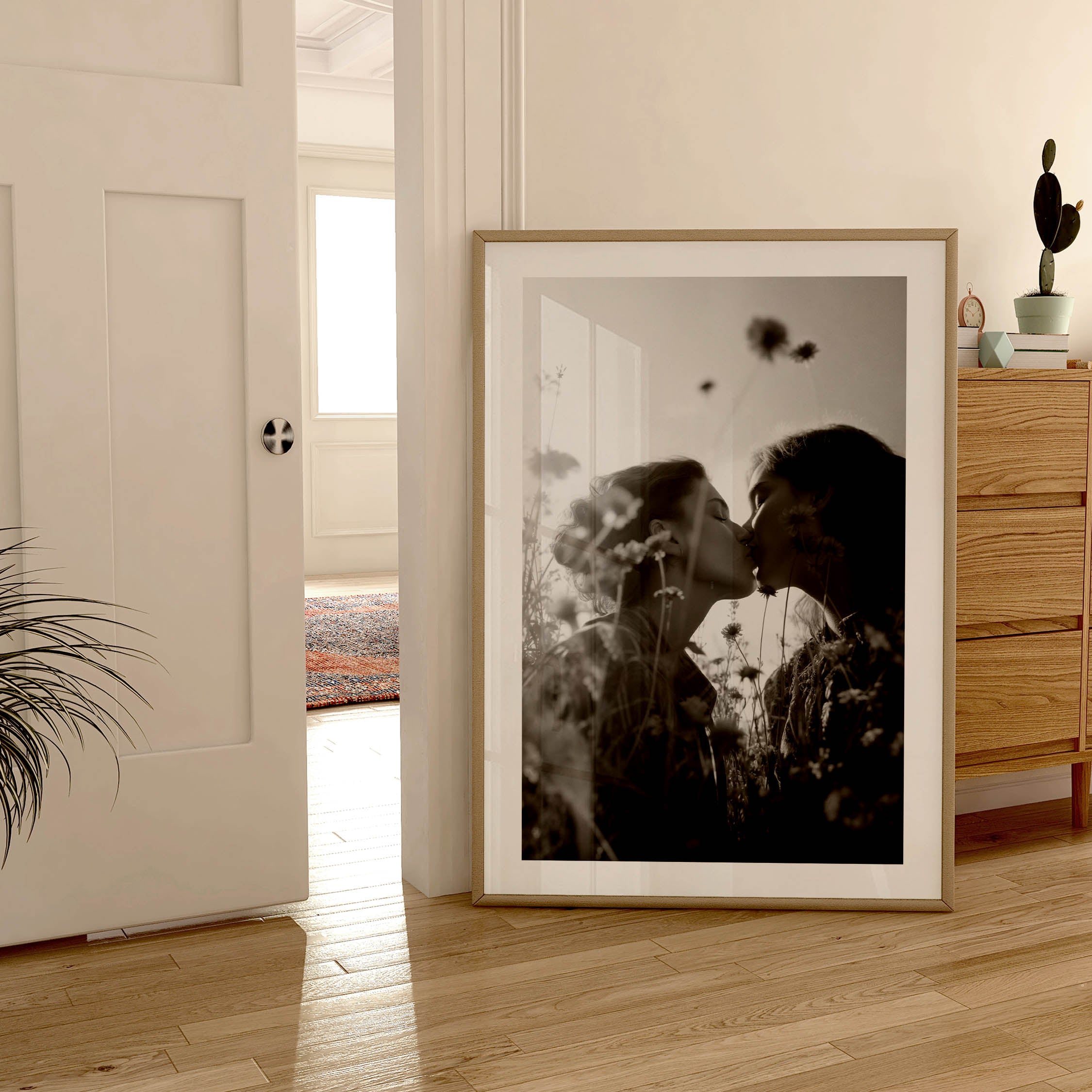 black and white poster of 2 woman kissing in a field of flowers, vintage, wall art, prints, wall decor, fine art