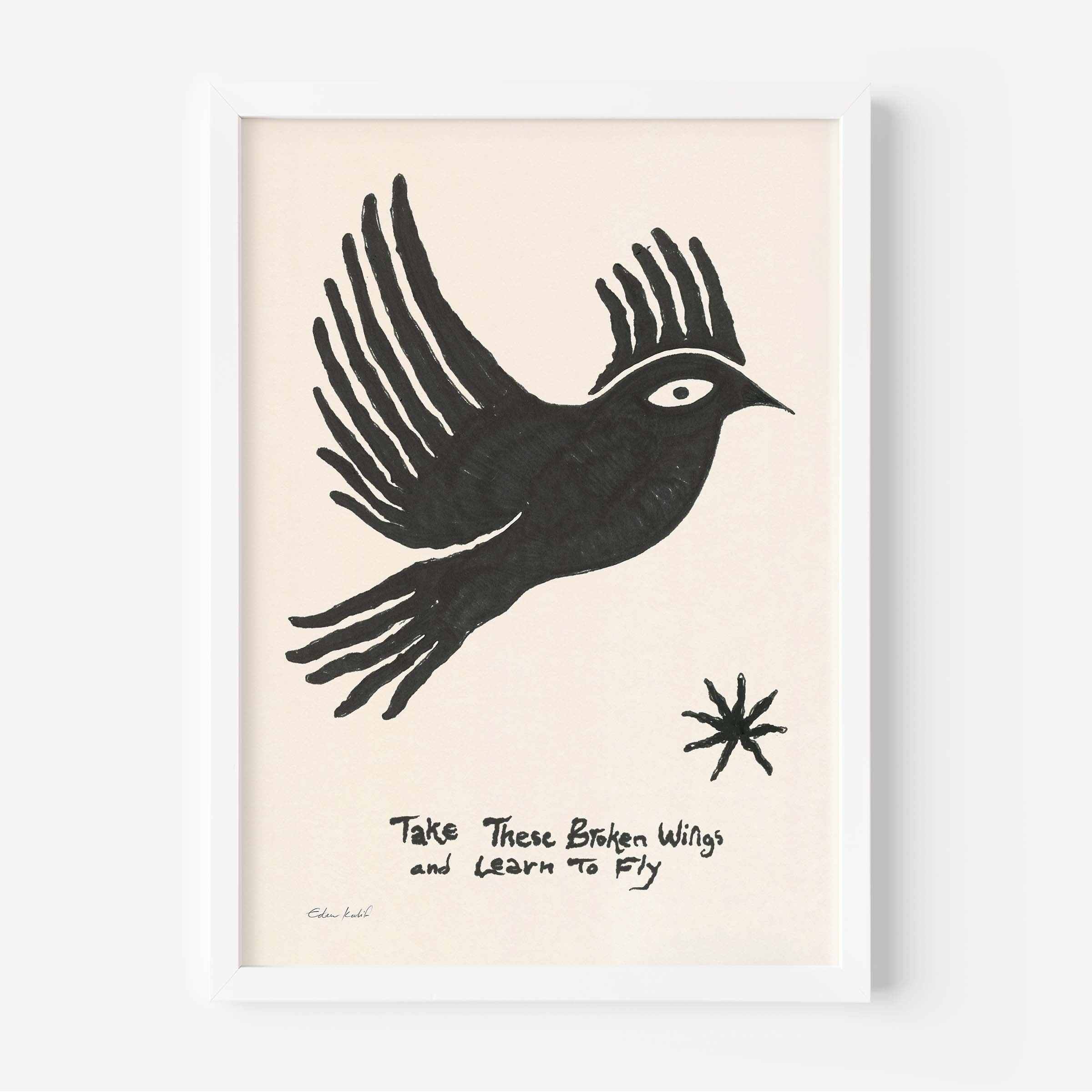 Framed art print by Eden Kalif featuring a bold black hand-drawn bird in flight on a cream background, with the handwritten text "Take These Broken Wings and Learn to Fly" and a small star motif. Printed on 230g matte paper in a black frame.