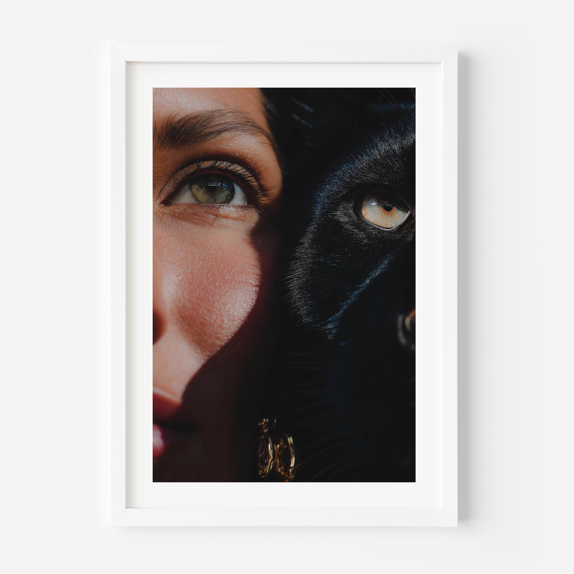 This fine art print features a powerful close-up of a woman and a black cat, their eyes aligned in perfect harmony. The rich shadows and sharp detail create a dramatic, gallery-worthy aesthetic that elevates any modern interior.