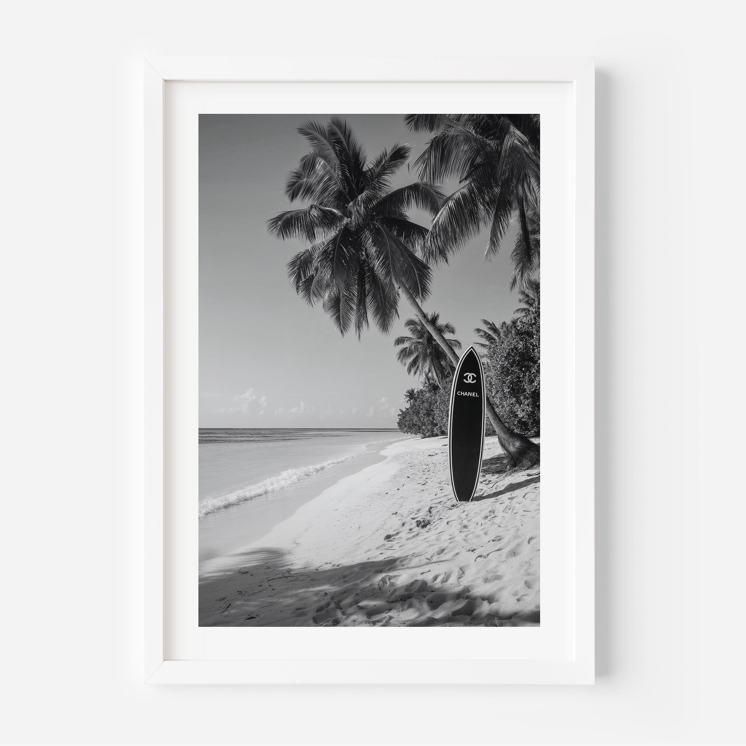 Luxury meets paradise in this black and white surfboard print. Elevate your walls with timeless fashion-inspired coastal art.