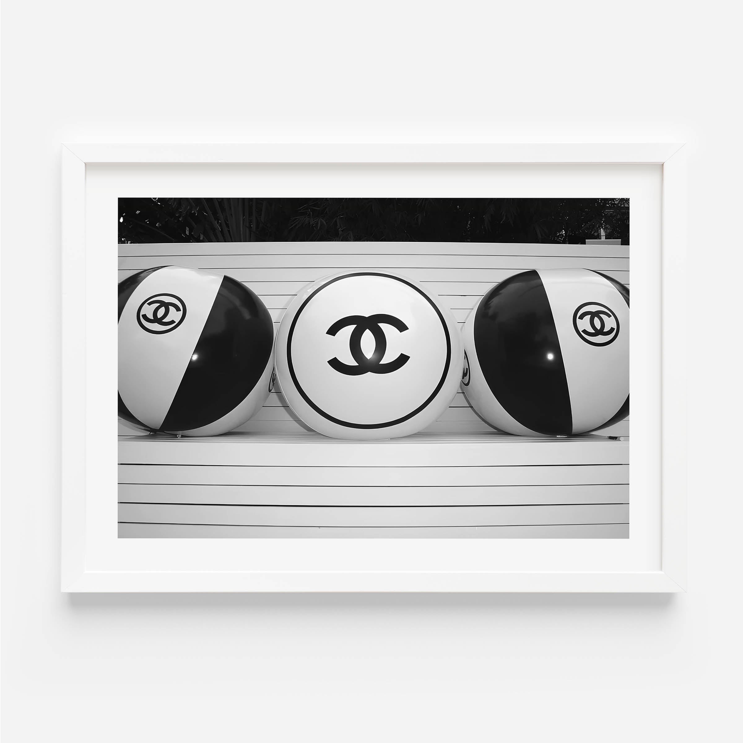 Black and white poster of chanel beach balls