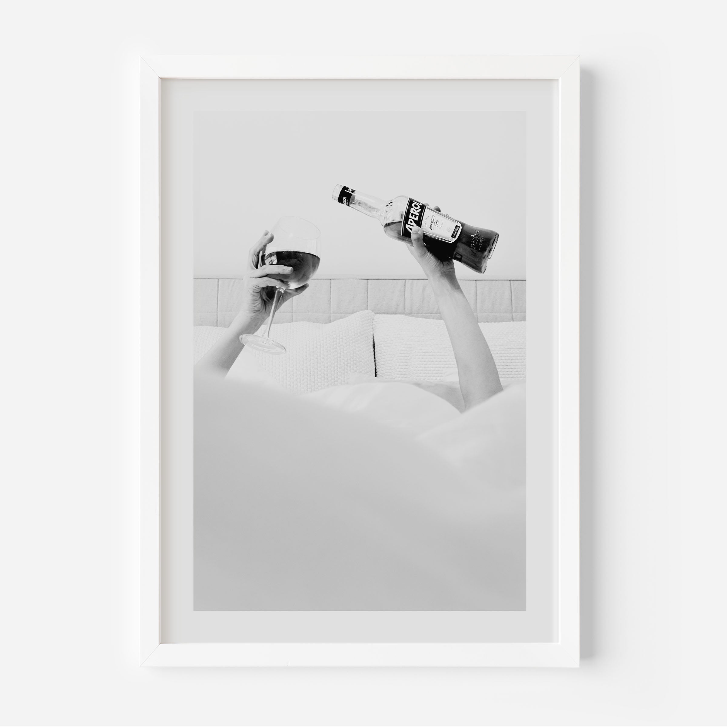 black and white poster of a woman drinking aperol in bed poster, home decor