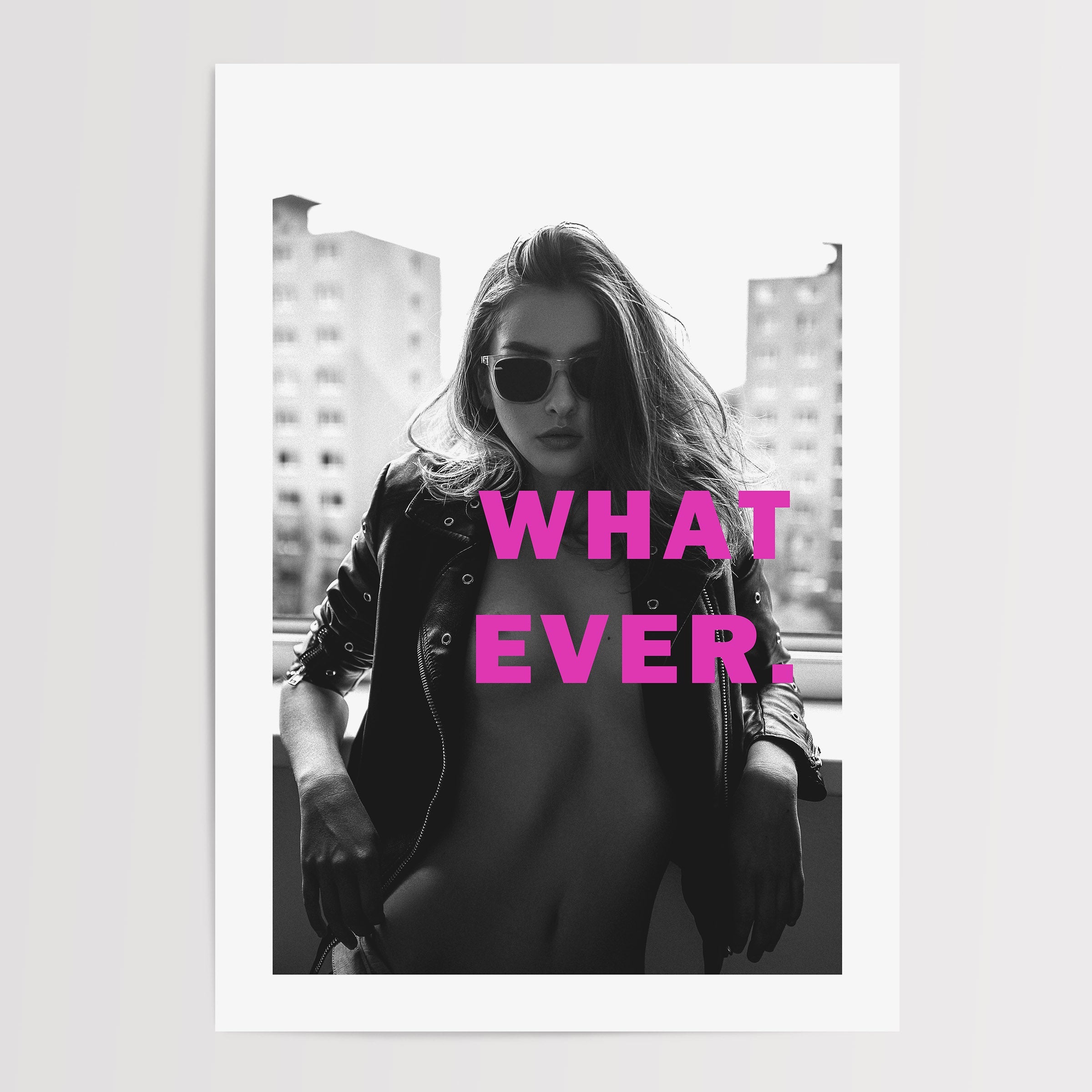 black and white poster of a woman posing with attitude half naked. the picture has pink text saying what ever.