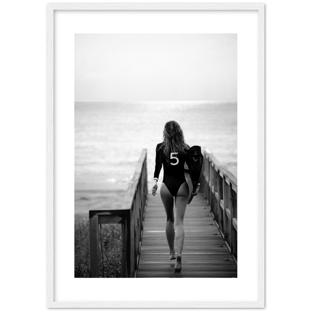 black and white poster of a girl going surfing
