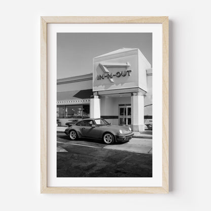 Black and white Porsche parked at In-N-Out – fine art wall print by Deston Isas.