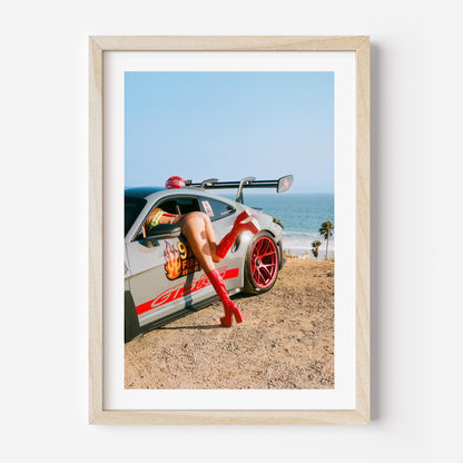 Porsche GT3 RS fire-rescue with red boots by the ocean – bold fine art wall print by Deston Isas for modern interiors.