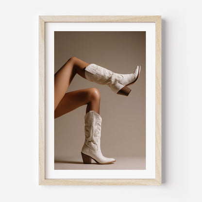 Add western-chic luxury to your walls with White Heat, a fine art print featuring ivory cowboy boots in a high-fashion composition.