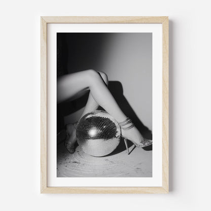 Bring the party home with this glamorous black-and-white fine art print featuring glittering heels and a disco ball. Perfect for bold, stylish interiors.