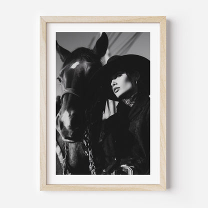 Elevate your space with Shadows of the West, a dramatic black-and-white cowboy and horse portrait. A timeless fine art print for western and equestrian enthusiasts.