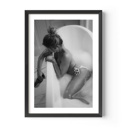 Fine art black-and-white print of a woman in a bathtub. Minimalist, sensual, and elegant — perfect wall art for modern interiors. Museum-quality print