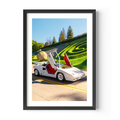 White Lamborghini Countach with scissor doors open – fine art wall print by Deston Isas, retro supercar photography for interiors.