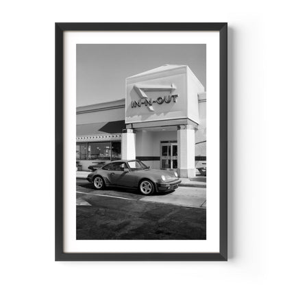 Black and white Porsche parked at In-N-Out – fine art wall print by Deston Isas.