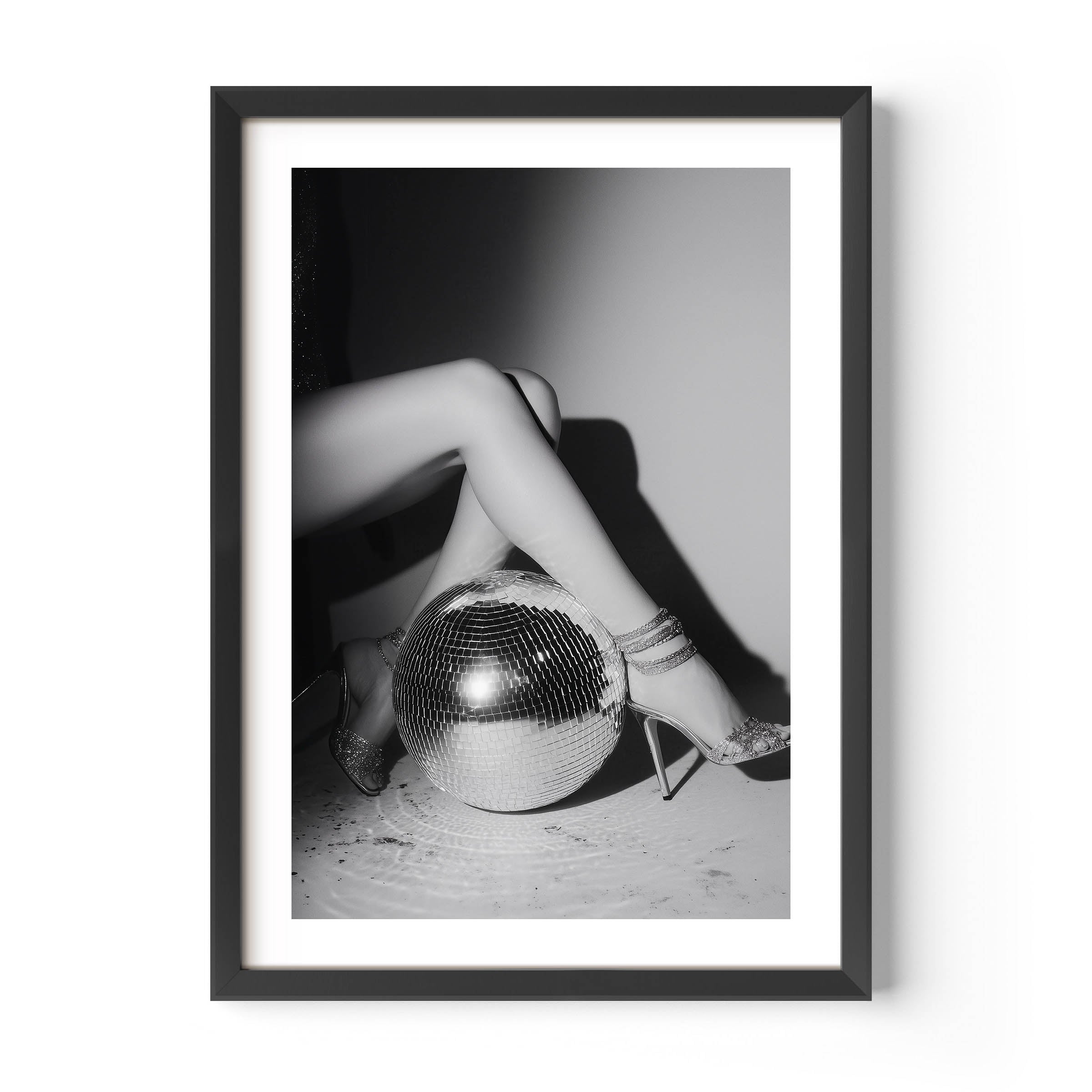 Bring the party home with this glamorous black-and-white fine art print featuring glittering heels and a disco ball. Perfect for bold, stylish interiors.