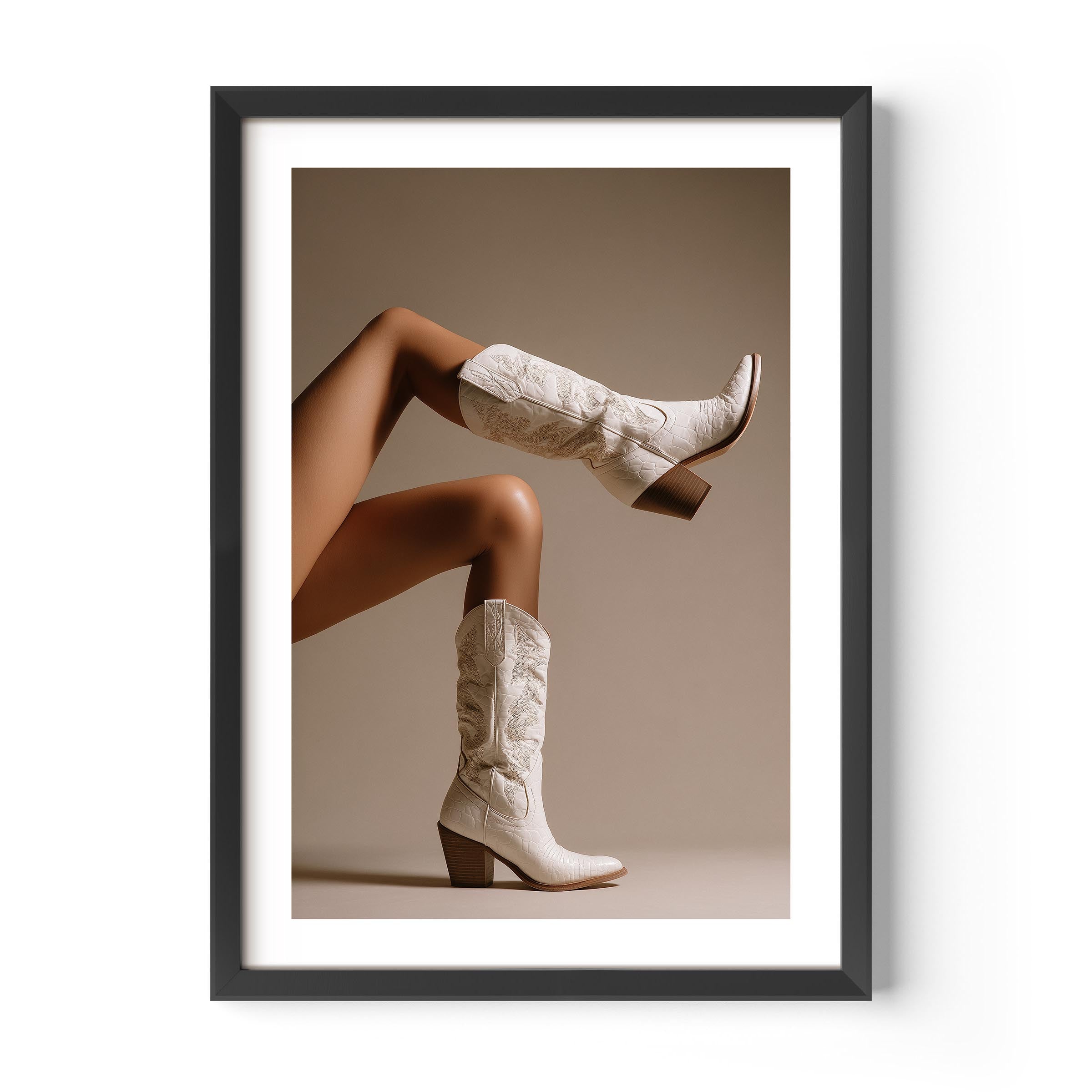 Add western-chic luxury to your walls with White Heat, a fine art print featuring ivory cowboy boots in a high-fashion composition.