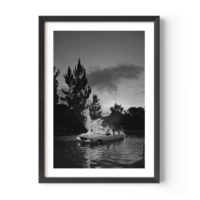 blak and white poster of a bwm car burning in a pool during an afterparty, wall decor, print, interior design