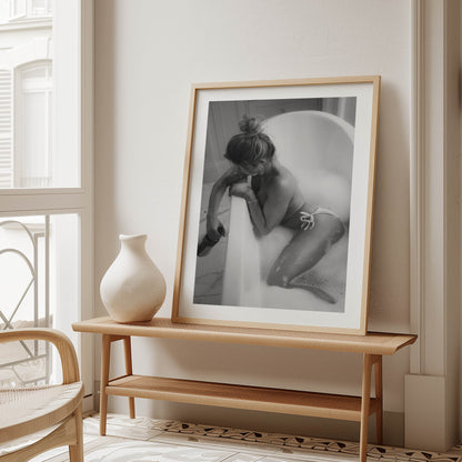 Fine art black-and-white print of a woman in a bathtub. Minimalist, sensual, and elegant — perfect wall art for modern interiors. Museum-quality print