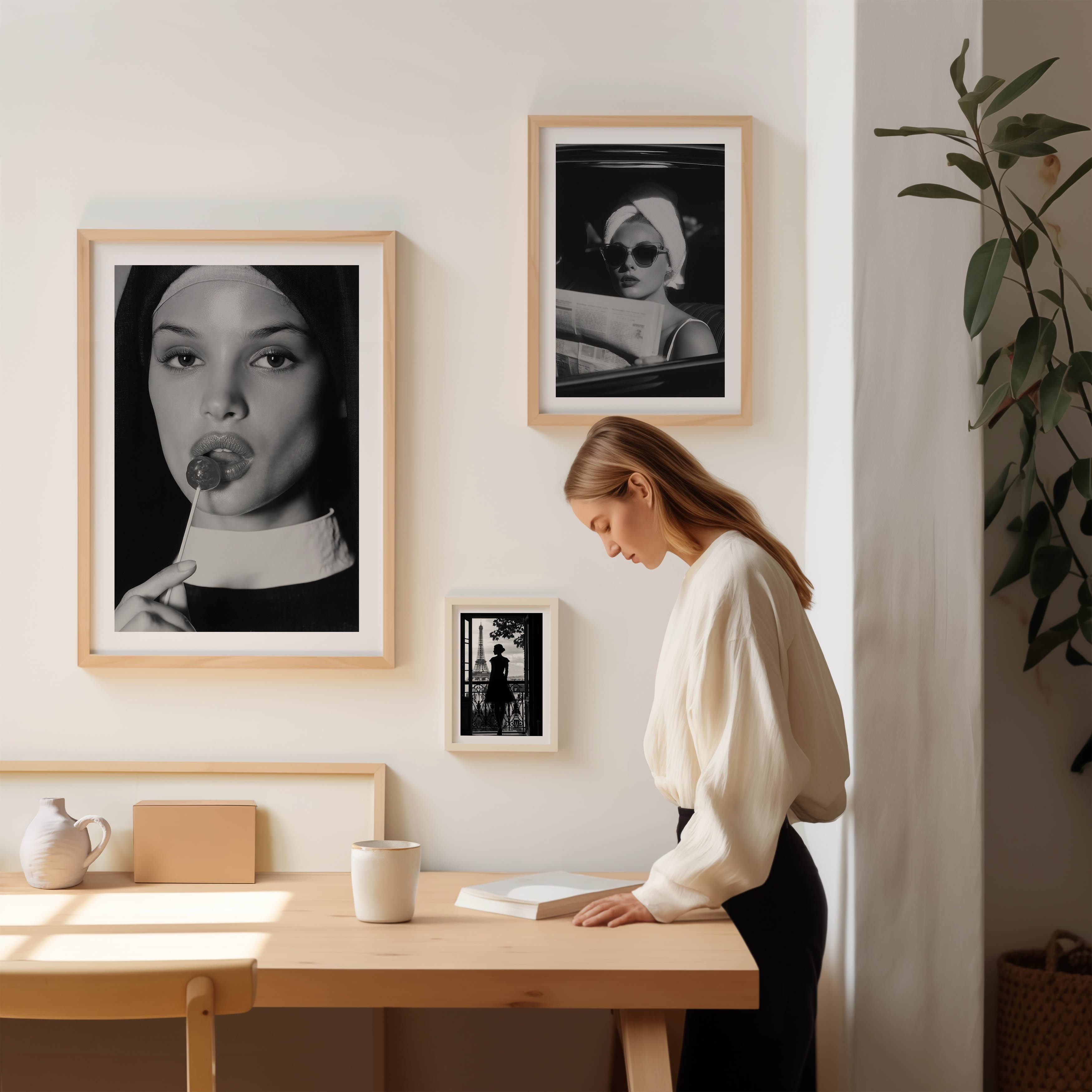 Black-and-white fine art photograph of a woman dressed as a nun, sensually holding a lollipop to her lips.