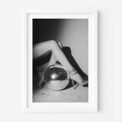 Bring the party home with this glamorous black-and-white fine art print featuring glittering heels and a disco ball. Perfect for bold, stylish interiors.