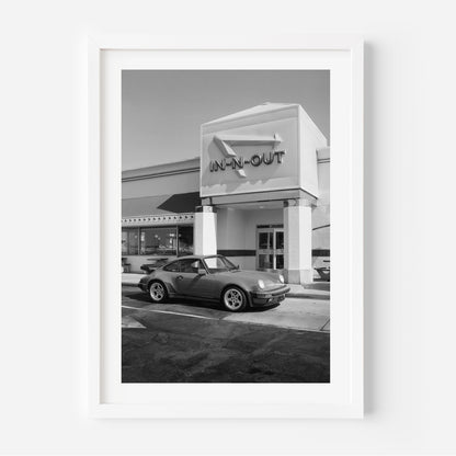 Black and white Porsche parked at In-N-Out – fine art wall print by Deston Isas.