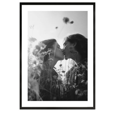 black and white poster of 2 woman kissing in a field of flowers, vintage, wall art, prints, wall decor, fine art