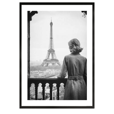 black and white poster of a woman standing on a balcony in Paris, France. Fine art/ wall art/wall decor.