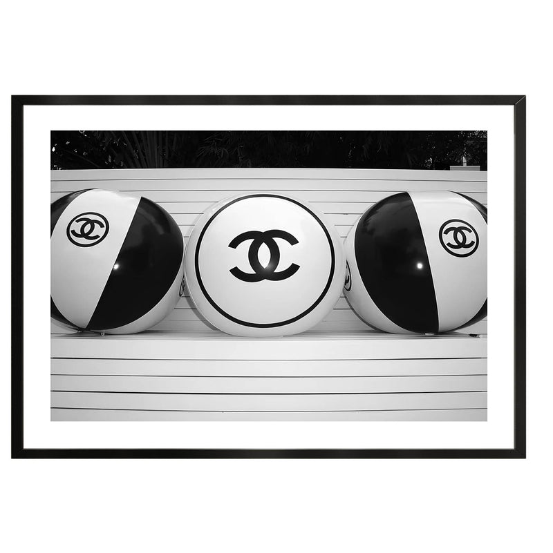 Black and white poster of chanel beach balls