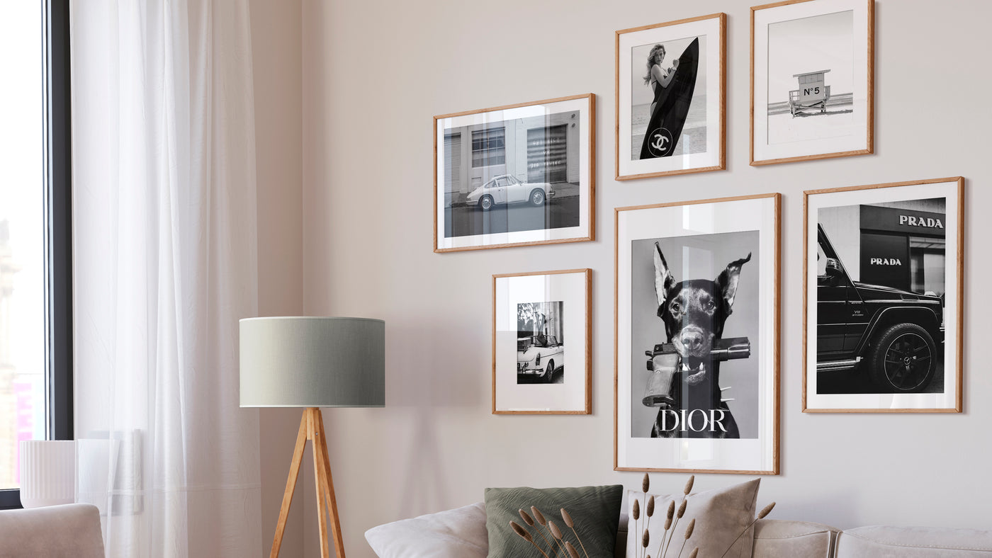 gallery wall with exclusive posters and wall art decorating a modern bohemium home interior living room 