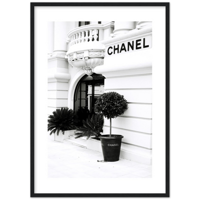black and white print of the outside of a Chanel store