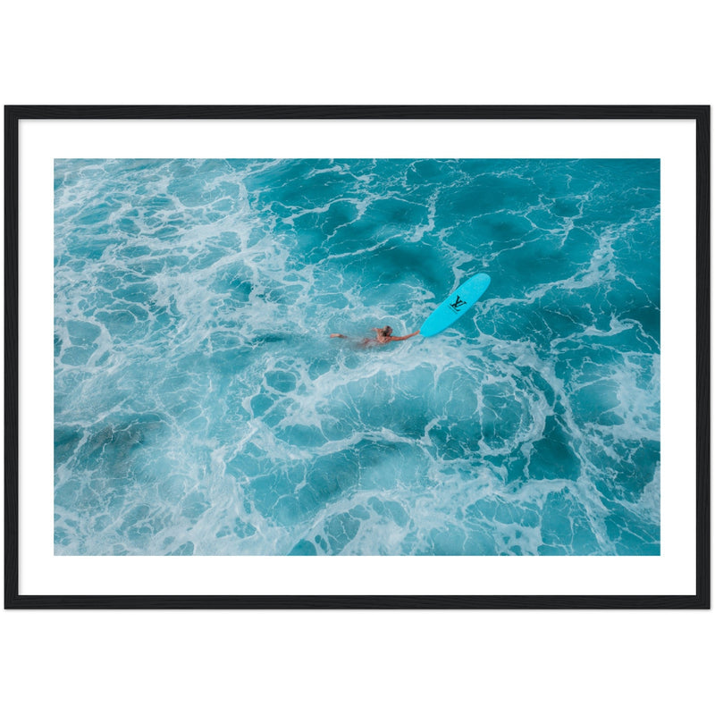 woman swimming with surfboard in clear blue water poster/ wall art
